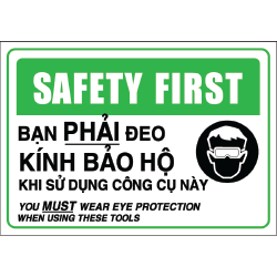 Biển cảnh báo SAFETY FIRST - Bạn phải đeo kính bảo hộ